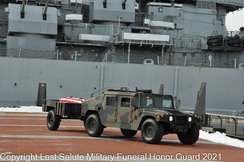 Last Salute's military caisson carries a flag draped casket at the Battleship New Jersey